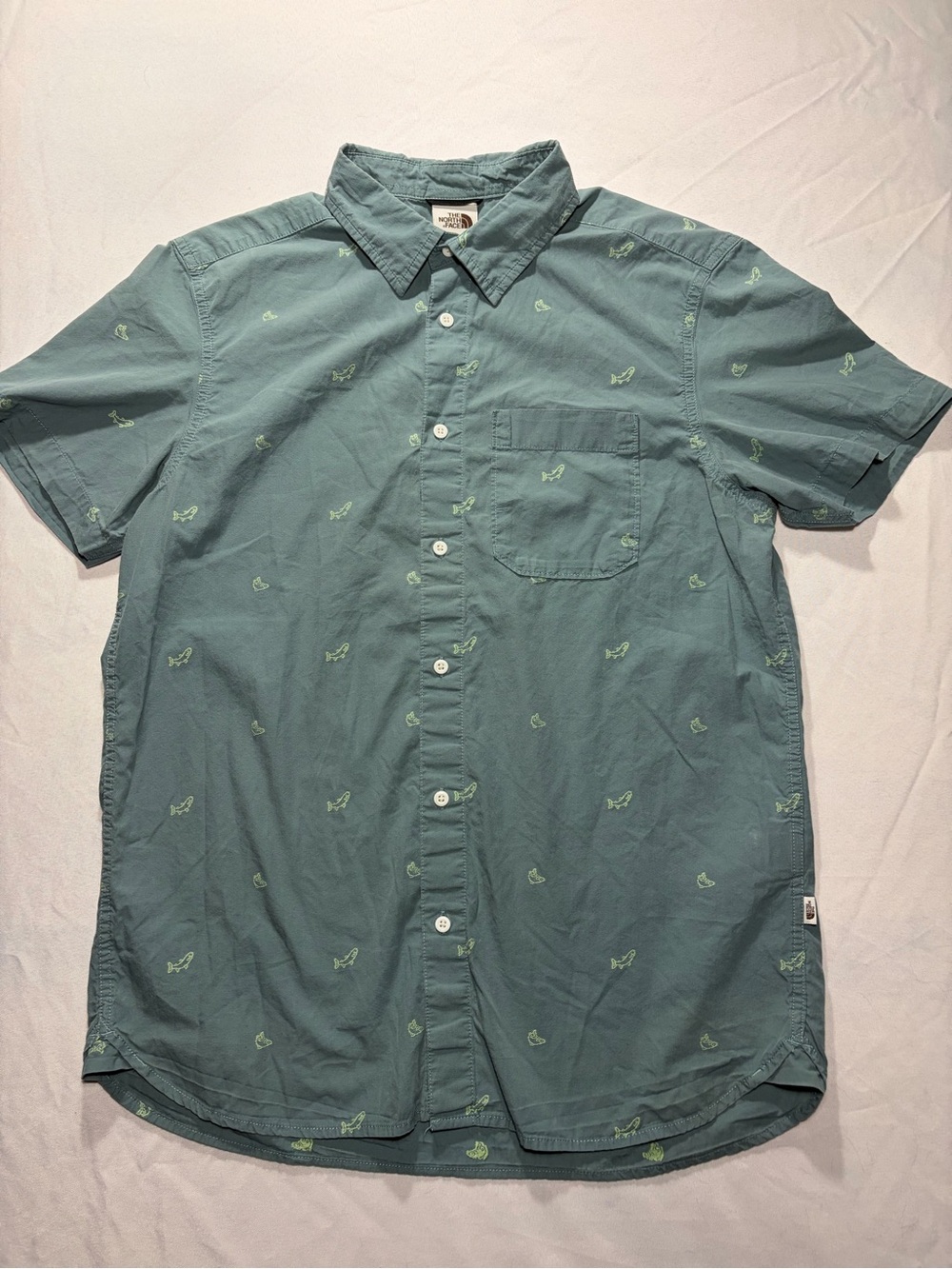 The North Face Men's Teal Short-Sleeve Button-Up Shirt with embroidered fish